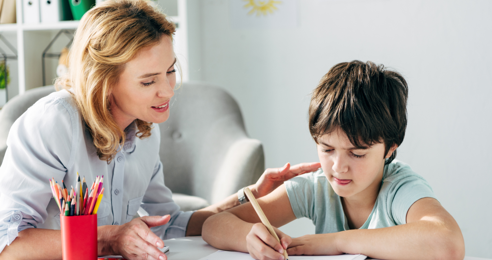 Educational psychologist working with a child