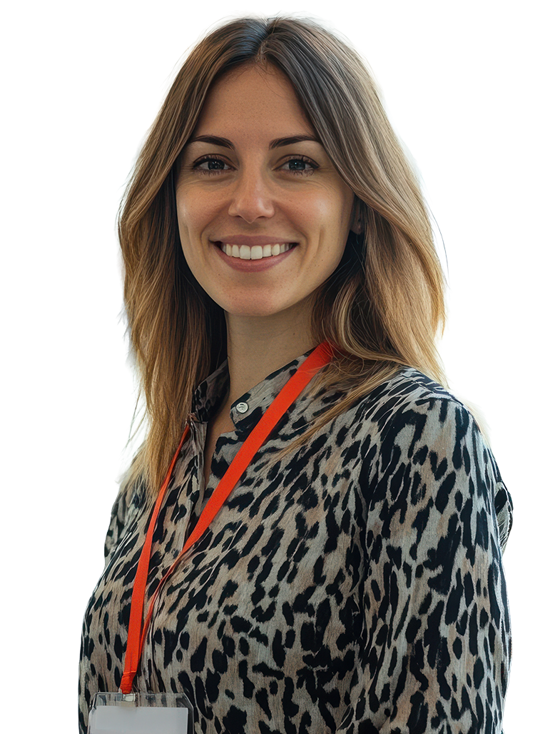 A professional wearing a leopard print top and red lanyard