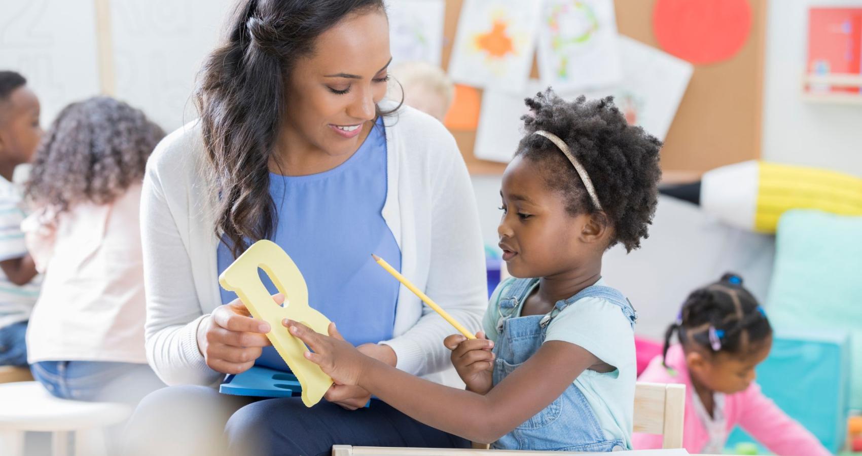 Educational psychologist working with a child