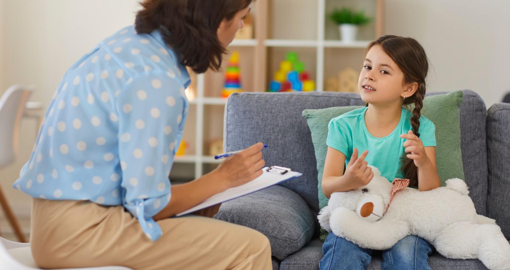 Educational psychologist working with a child