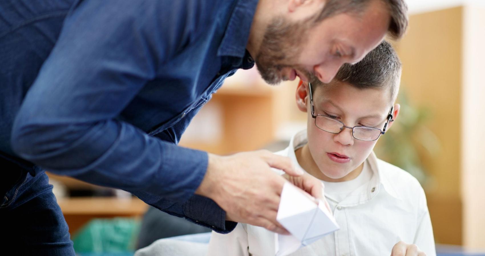 Educational psychologist working with a child