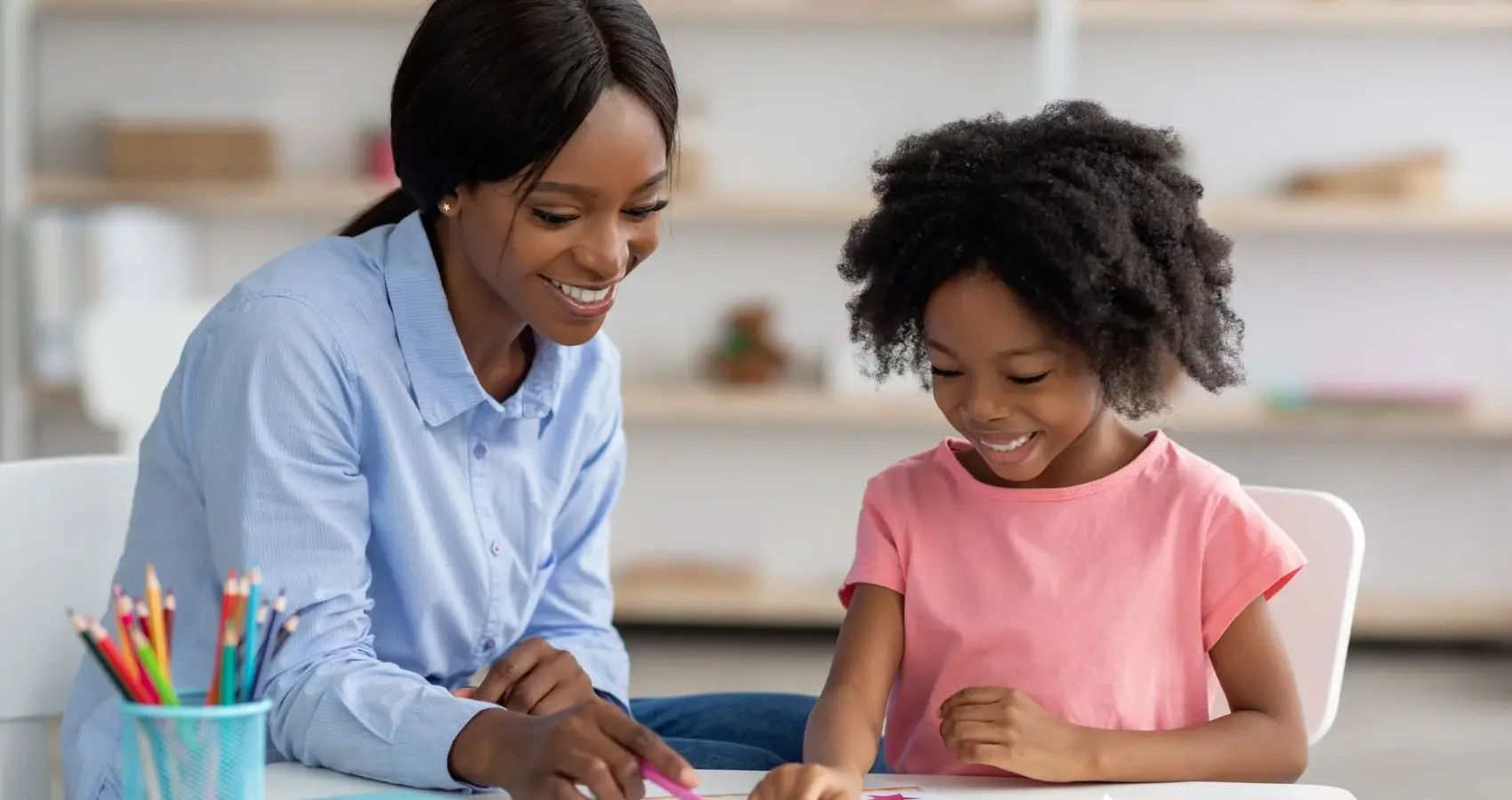 Educational psychologist working with a child