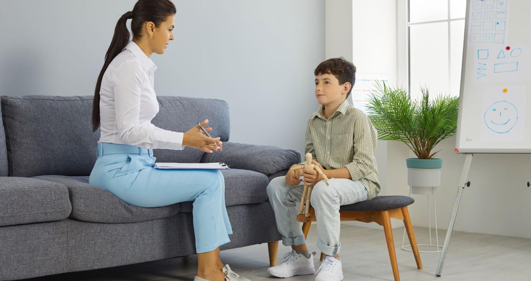 Educational psychologist working with a child