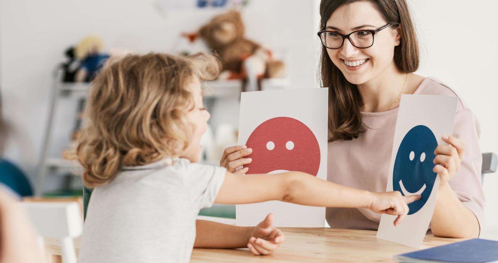 Educational psychologist working with a child