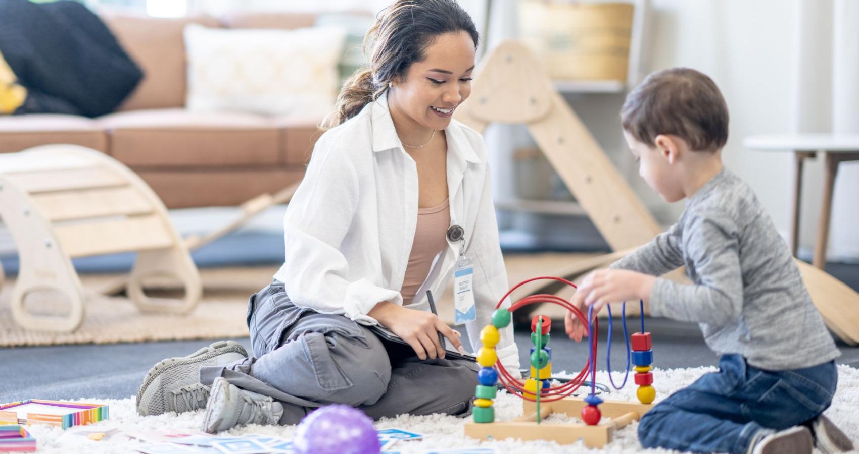 Educational psychologist working with a child