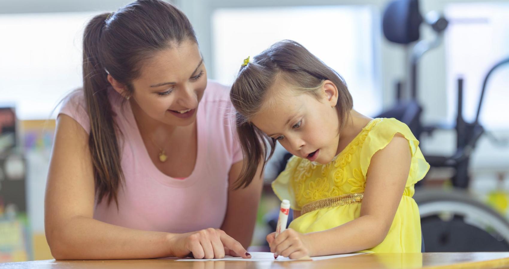 Educational psychologist working with a child