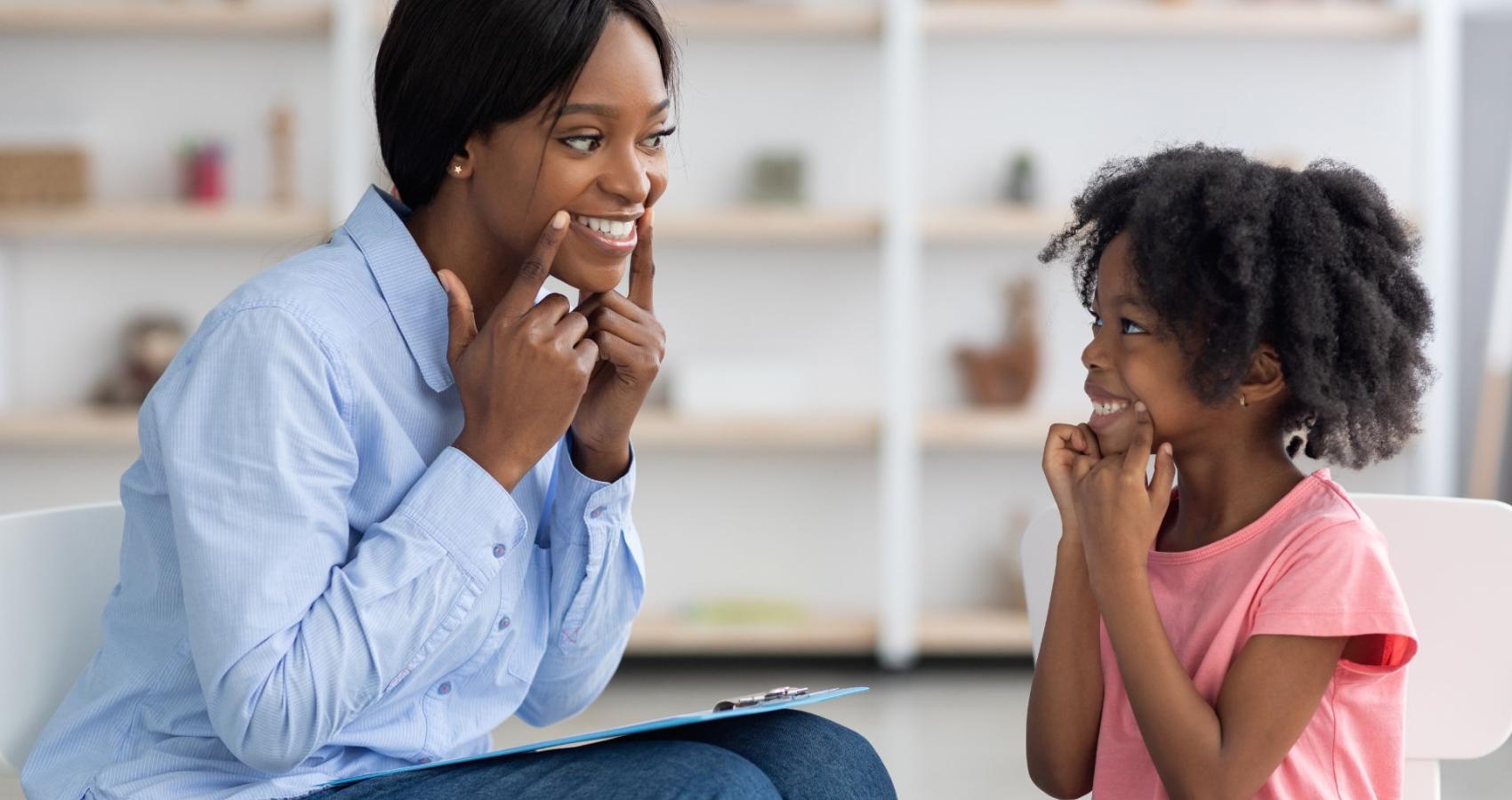 Educational psychologist working with a child