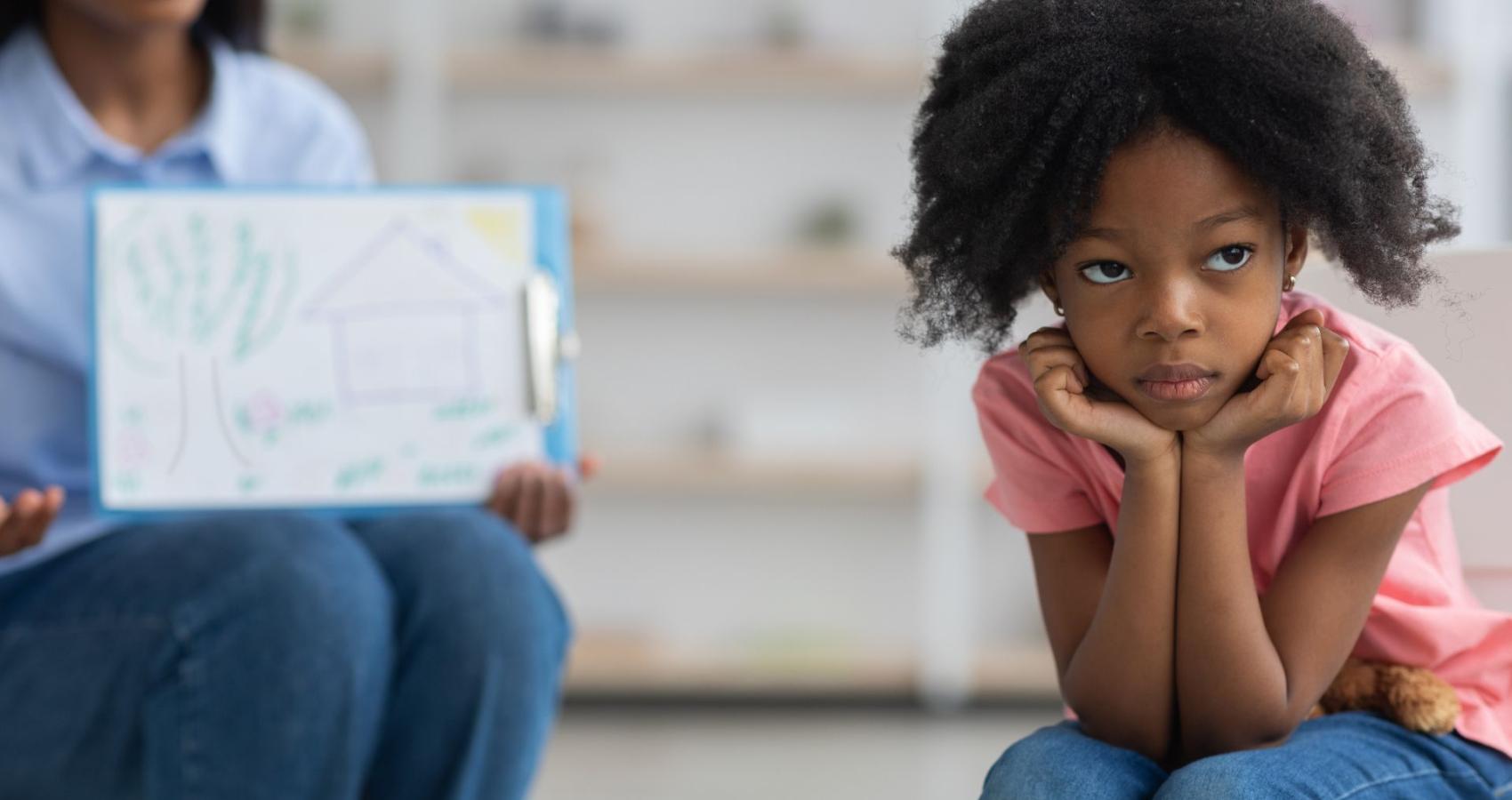 Educational psychologist working with a child