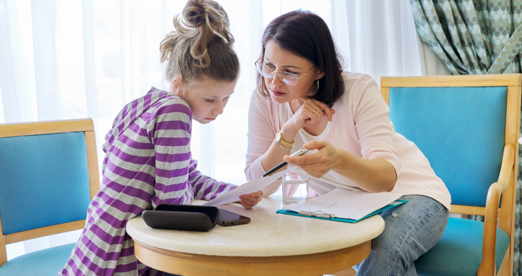 Educational psychologist working with a child