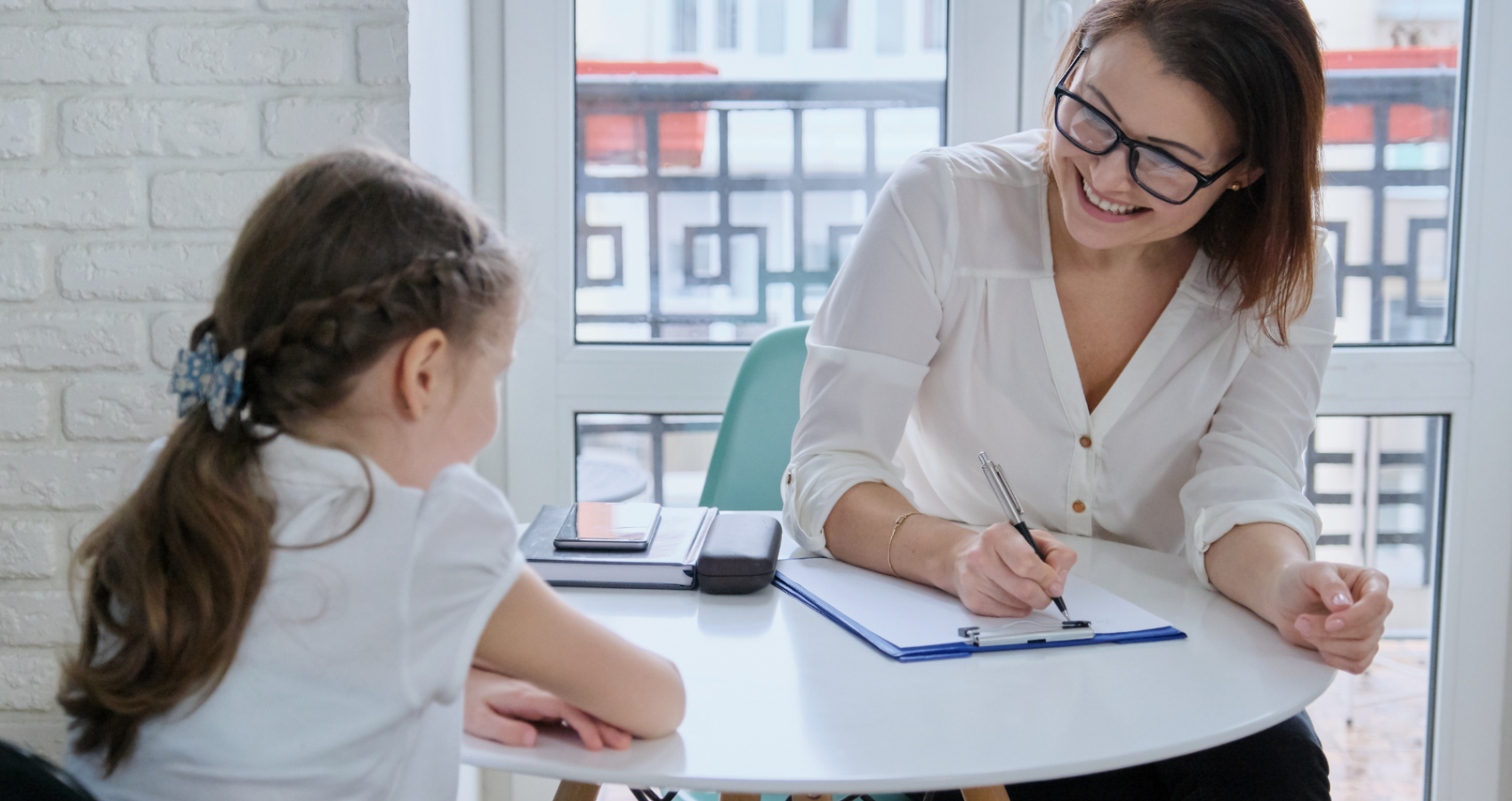 Educational psychologist working with a child