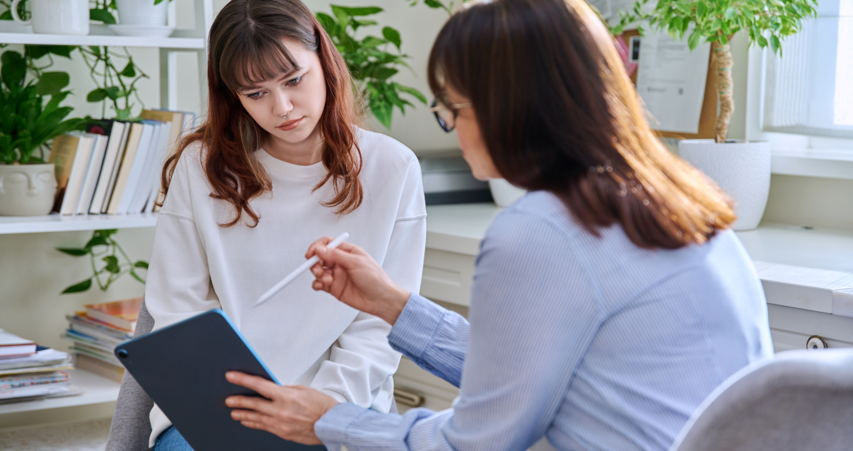 Educational psychologist working with a child