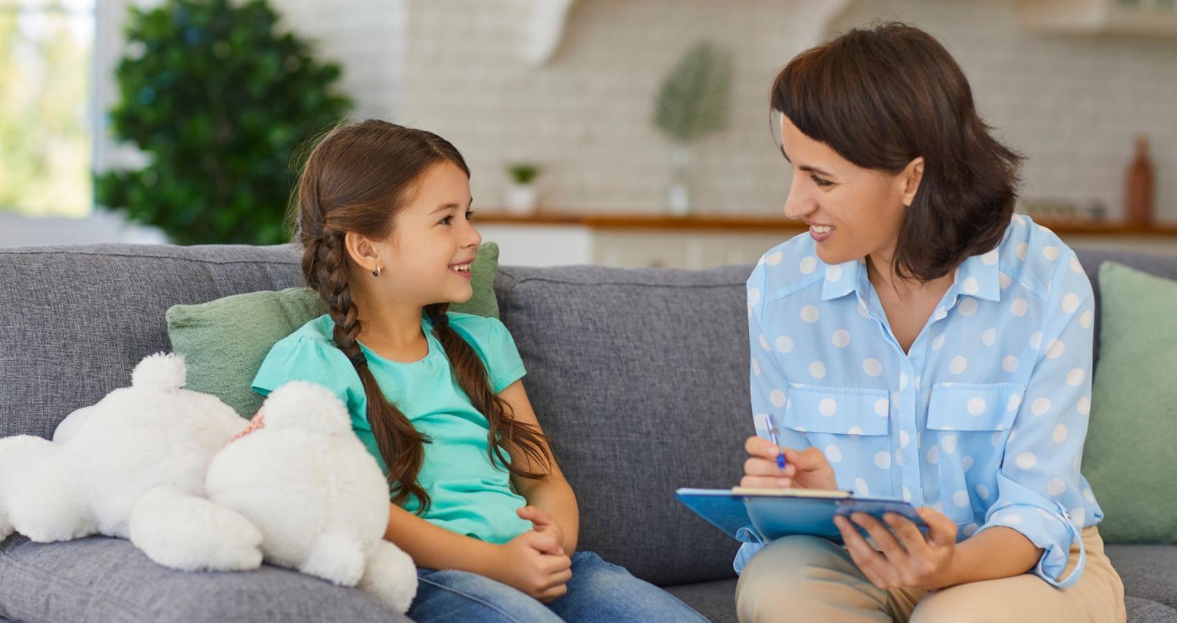 Educational psychologist working with a child