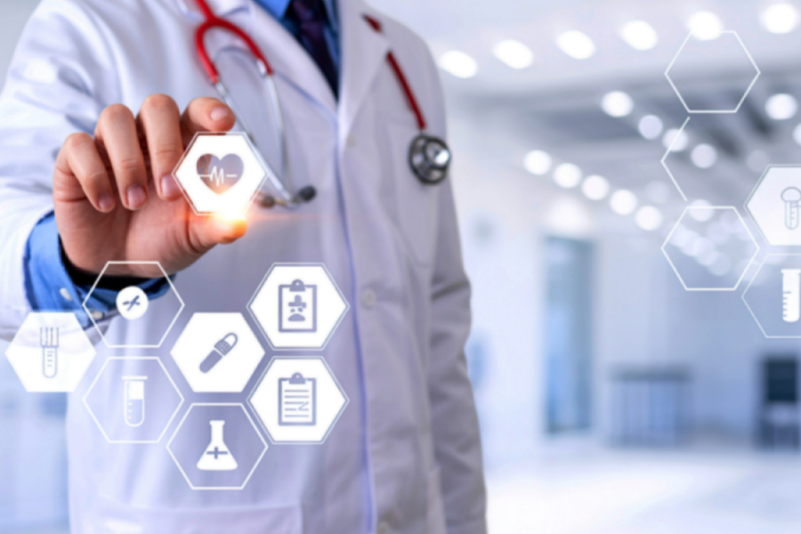 An adult holding health care icons